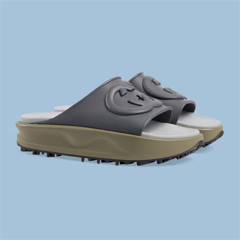 Men's Interlocking G slide sandal in light blue rubber 